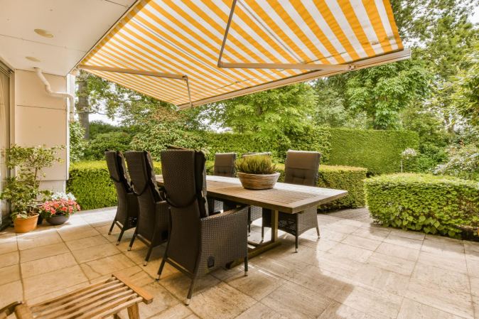 comfortable deck upgraded with a new awning