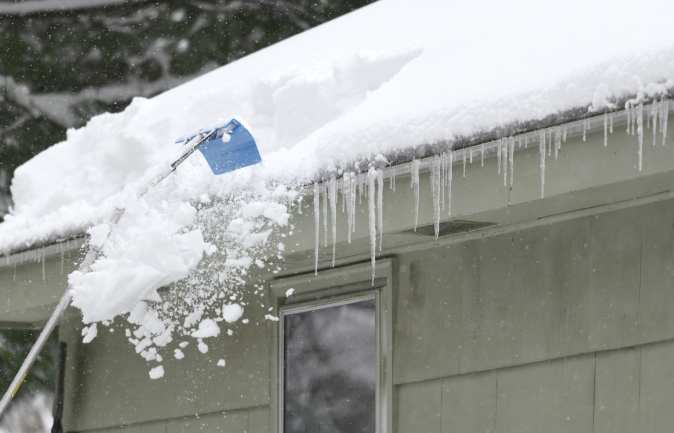 raking snow off roof